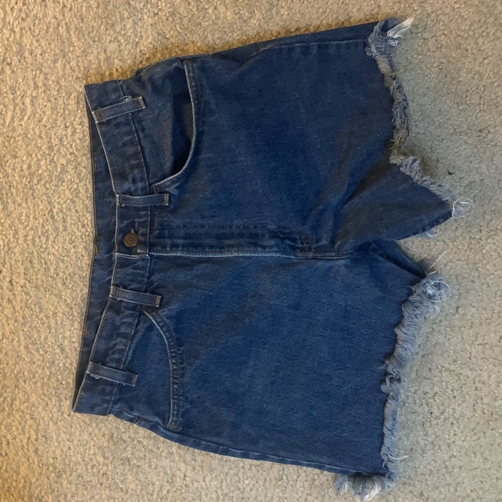 Authentic high waisted Levi jean shorts with frays